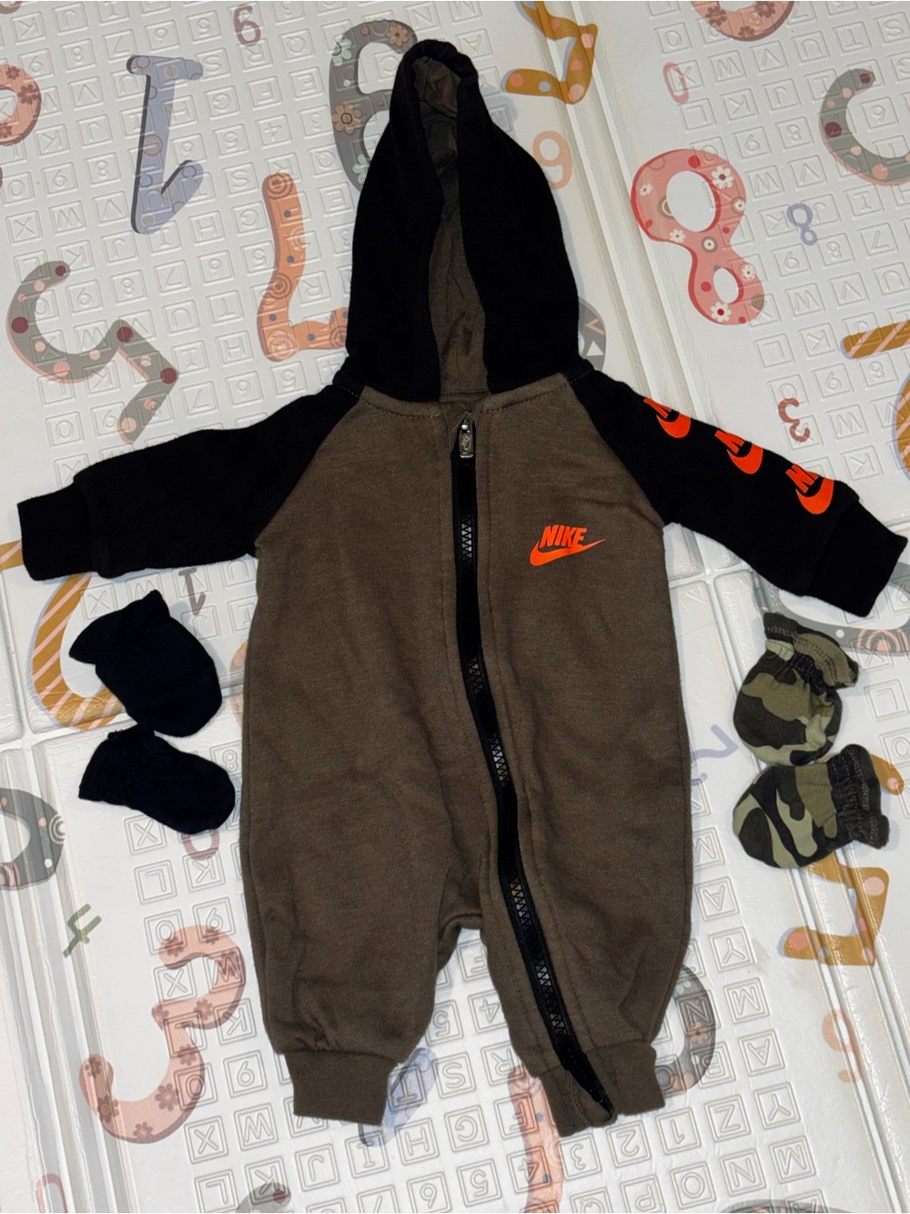 Nike Brown and Black Hooded Baby One-Piece with Orange Logo